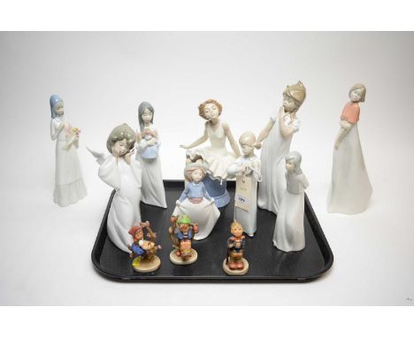 A selection of Spanish and Continental decorative ceramic figures, including: Lladro figure of an angel; Nadal figure of a ba