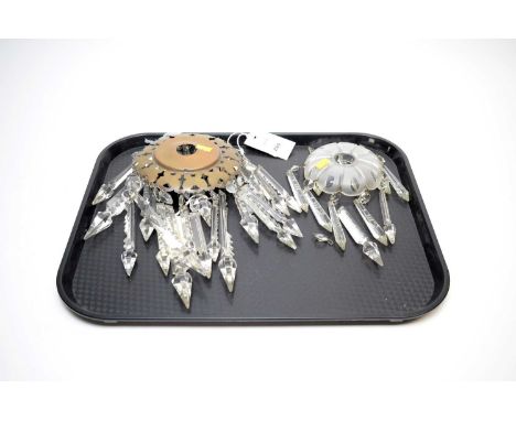 A Victorian brass and crystal light fitting, formed of a pierced circular brass plate with crystal lustre drops (lacking fixt