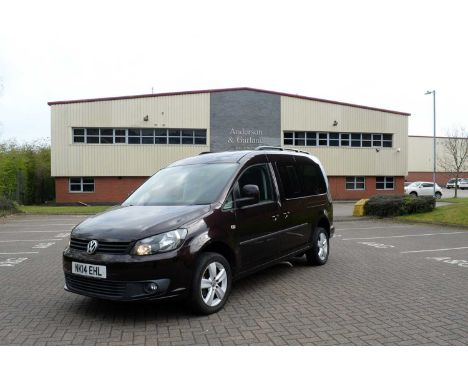 A 2014 Volkswagen Caddy Maxi C20 Life TDI S-A purple motor car, disability wheelchair-accessible, registration number NK14 EH