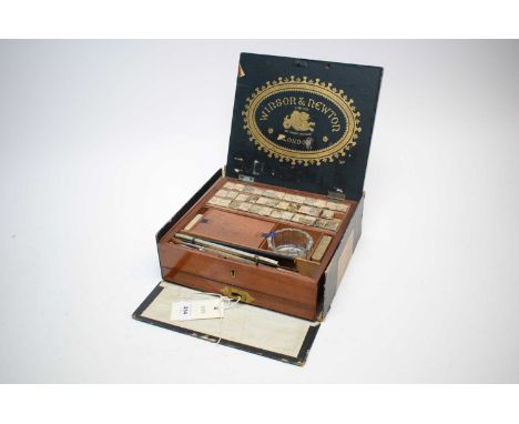 A Windsor &amp; Newton Ltd London 18 cake ‘Complete’ Artists Paint Box, the mahogany case fitted with paints, accessories and