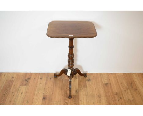 A 19th Century mahogany occasional table, the tabletop of rectangular form with beaded edge, single turned column raised on t