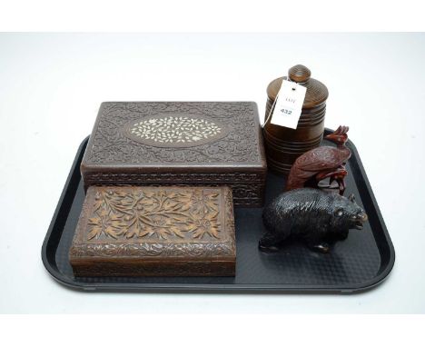 A selection of treen collectibles, including: two carved rectangular trinket boxes; turned wood tea caddy with cover; Black F
