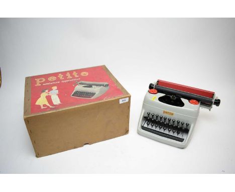 A Petite Miniature or children’s typewriter, in grey, with original box.