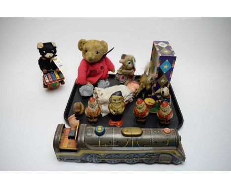 A selection of vintage tin plate and other toys and models, including: windup drummer bear toy; Santa Clause clockwork tinpla