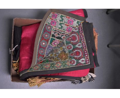 A needlework upholstered and beaded floral tapestry or wall hanging, with Paisley pattern, flower head and scrolling foliate 