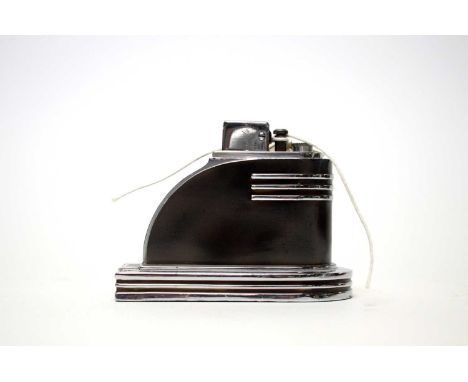 An Art Deco Touch Tip table lighter, by Ronson, 9cms high.