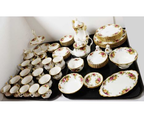 A Royal Albert ‘Old Country Roses’ dinner and tea service, comprising 6 place settings, salt and pepper shakers, cream and su