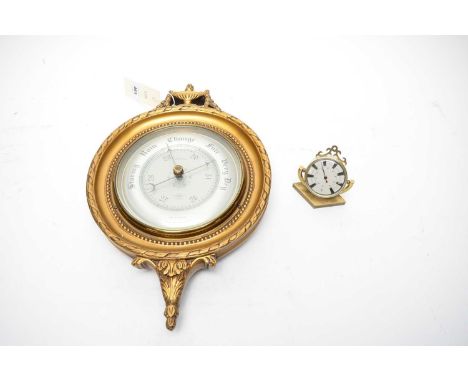 A vintage 20th Century reproduction gilt framed barometer, the urn finial with ribbon motifs to the border, 37cm high; togeth