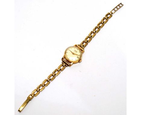 A 9ct yellow gold Tissot cocktail watch, with date aperture and manual wind movement, 16.1g gross. 