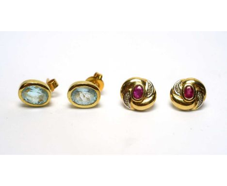 A pair of light blue topaz earrings, in 9ct yellow gold mounts, post and butterfly fitting; and a pair of ruby and diamond ea