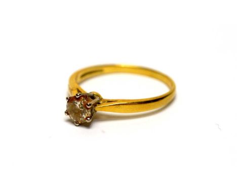 A single stone diamond ring, the brilliant cut diamond weighing approximately 0.65carats, in 18ct yellow gold mount and shank