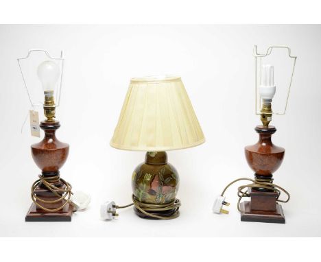 A pair of burr walnut style urn table lamps; together with a Chinoiserie butterfly and floral decorated table lamp, with shad