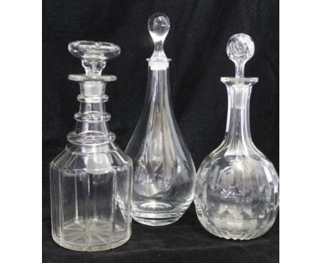 A GEORGIAN TRIPLE RING NECK DECANTER, with mushroom stopper, together with a plain teardrop decanter and one other facet cut 