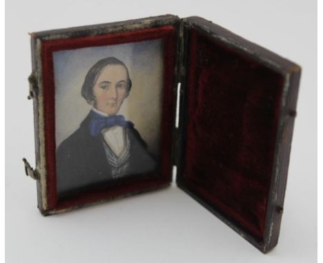 A MID 19TH CENTURY MINIATURE PORTRAIT PAINTING, a young gentleman wearing a blue bow tie, watercolour on paper, cased, image 