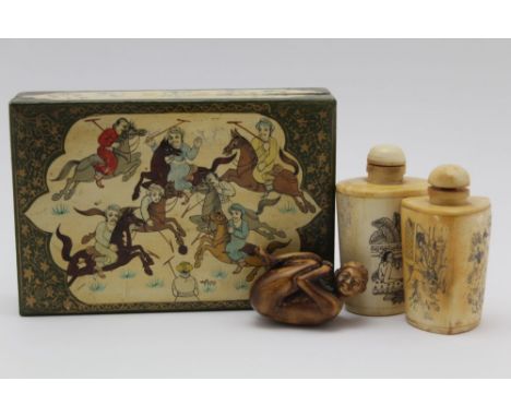 AN INDIAN KASHMIR BOX &amp; COVER, the lid decorated with a polo match, 15cm x 10cm, together with two Japanese bone snuff bo