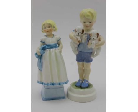 TWO ROYAL WORCESTER BONE CHINA FIGURES, 'Monday's Child is fair of Face', one modelled as a boy with two puppies, No. 3519, 1