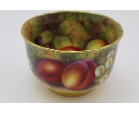 A ROYAL WORCESTER HAND PAINTED PORCELAIN BOWL, painted in the round with fruit, also internally painted with fruit and signed