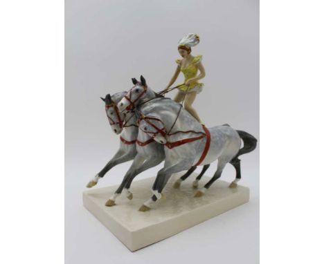 A ROYAL WORCESTER BONE CHINA FIGURE GROUP, 'In the Ring', modelled by Doris Lindner, depicting a circus performer standing as