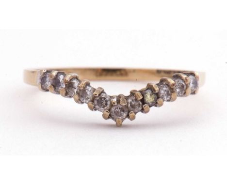 9ct gold and diamond wishbone design ring featuring eleven small single cut diamonds, size M