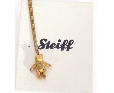 Boxed Steiff gilt metal teddy bear pendant suspended on a gold plated necklace in a Steiff cardboard box