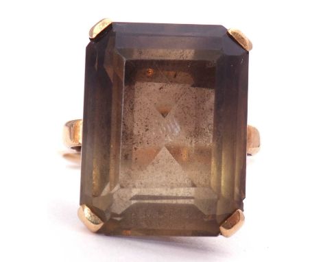 9ct gold smoky quartz ring, claw set with a large rectangular step cut smoky quartz, 18 x 10mm, raised in a basket setting to