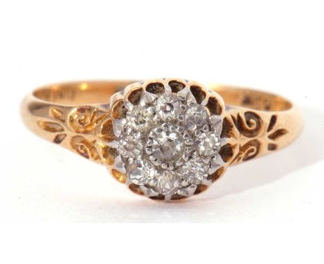 Diamond cluster ring, the principle diamond 0.05ct approx, surrounded by eight small old cut diamonds, stamped 18ct, size M