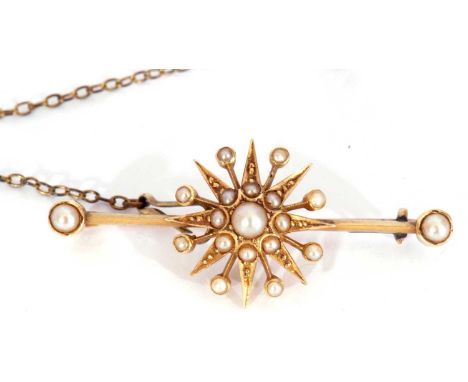 Antique seed pearl starburst bar brooch, the knife edge bar stamped 15ct, 4.5cm long (lead repaired)