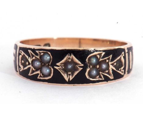 Victorian mourning ring, a continuous band of black enamel, the top section set with small seed pearls, and the words 'In Mem