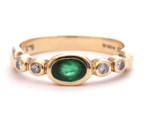 9ct gold, emerald and diamond ring, the centre oval emerald bezel set between small diamond set shoulders (4), size K