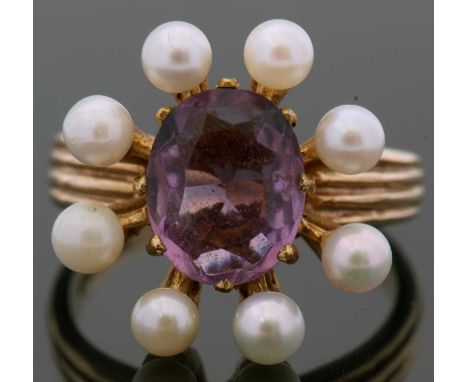 9ct gold amethyst and small pearl ring, the oval faceted amethyst surrounded by small cultured pearls, each individually set 