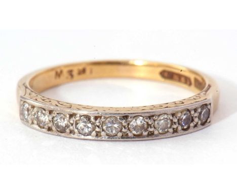 Diamond set half eternity ring featuring nine small single cut diamonds, all between a scroll engraved gallery, stamped 18ct 