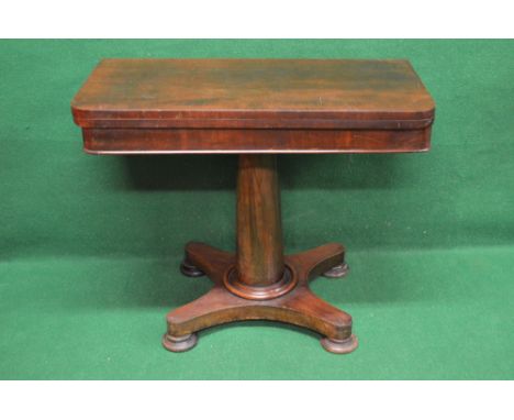 Mahogany fold over card table with circular green baize supported by turned column leading to quad form base and bun feet - 3