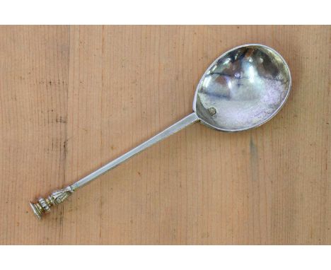 A Charles I silver seal top spoon,by IF, London 16__,with a fig-shaped bowl, the stem applied with a large fluted and baluste