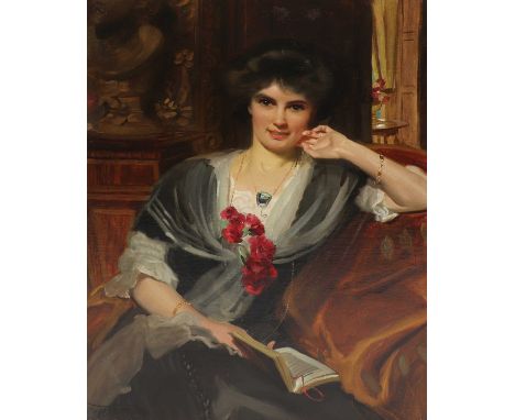 *Frank Owen Salisbury (1874-1962)Portrait of a lady, three-quarter length seated, in a grey dress and holding a booksigned 'F