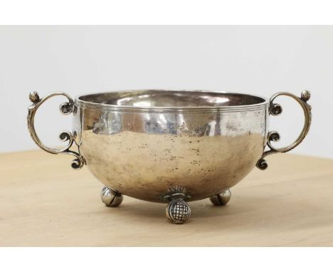 A Scandinavian silver marriage bowl or écuelle,mid-17th century, stamped with a device for either a town or a maker's mark (p