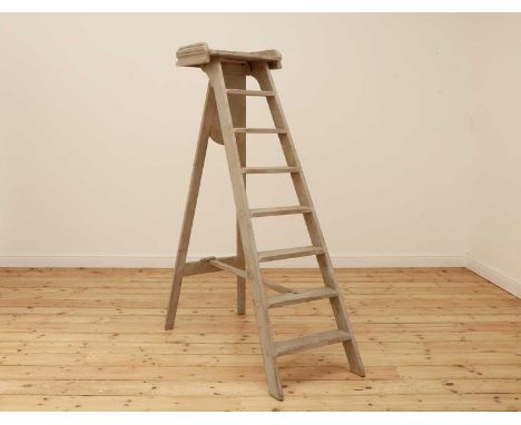 A painted artist's studio ladder,20th century, French,50cm wide117cm deep165cm highCondition report: Knocks and wear. Rubbing