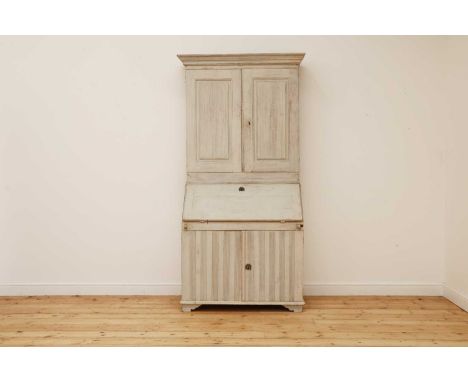 A Swedish Gustavian painted bureau bookcase,late 18th/early 19th century, the moulded cornice above a pair of panelled doors,