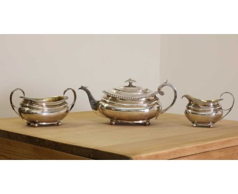 A Scottish George III silver three-piece tea set, by William Marshall, Edinburgh 1817, consisting of a teapot, sugar basin an