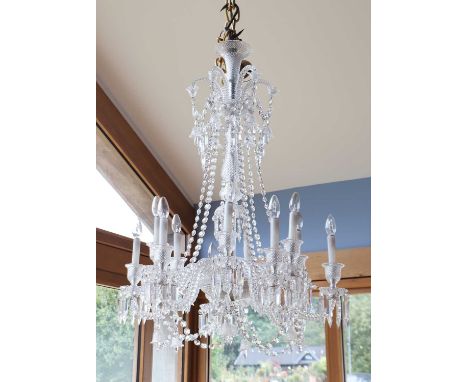 A cut-crystal twelve-light 'Zenith' chandelier by Baccarat,late 20th/early 21st century, each scrolling branch with a bell-sh