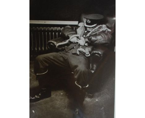 BRITISH SCHOOL, 20th century RAF Pilot asleep in a chair, print, 35cm by 23.5cm 