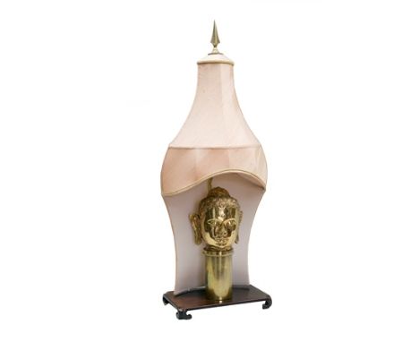 A brass Buddha head table lamp with silk pagoda niche shade, 1.05m high overall illustrated 