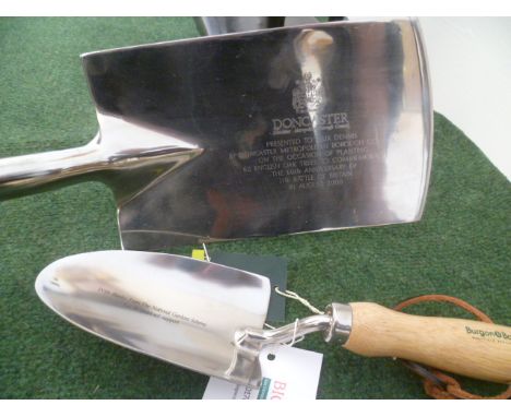 A presentation spade, and a presentation trowel, with certificate appertaining to opening gardens and tree planting, and awar