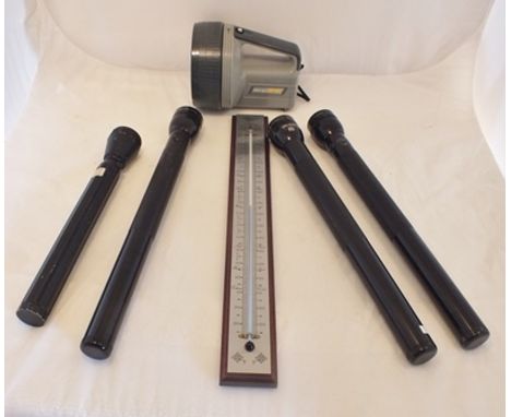 Three Maglite torches, a Mega spot light, another alloy torch and a Russell of Norwich thermometer 