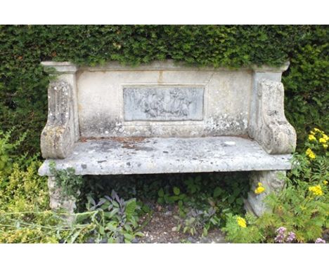 A 19th century carved stone bench of classical revival taste, the back inset a lead panel of putti, satyr and goat, moulded s