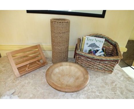 A selection of domestic wares, to include woven raffia stick stand, woven magazine rack, circular shallow bowl, and a folding