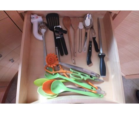 A selection of modern kitchen equipment, to include a "Sabatier" and "Stellar" knife block set, rolling pin, grater, scissors