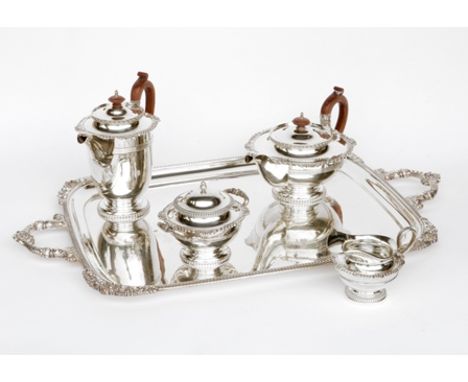 A matched four piece silver tea service, Walker &amp; Hall, Sheffield 1925, 1933 and 1934 and James Dixon &amp; Sons, Sheffie