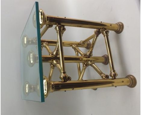 A brass tubular framed occasional or lamp table with plate glass top, 51cm square top, 66cm high 