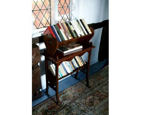 A Victorian walnut library table, the rectangular top with moulded edge, trough superstructure with pierced trefoil ends, scr