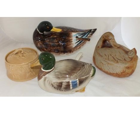 An Italian pottery soup tureen, fashioned as a duck, with cover and ladle, 43cm, together with a stoneware duck tureen, game 